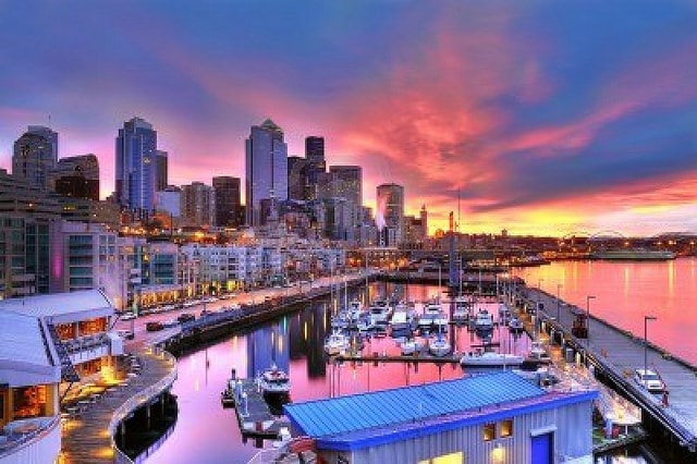10613576-famous-seattle-skyline-dazzling-under-a-beautiful-dawn-sky-across-pier-66-waterfront