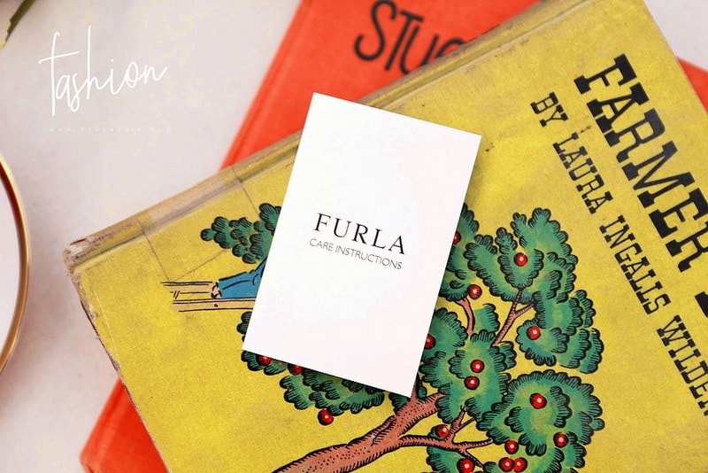 【敗家】小包包的好朋友。FURLA素面金字LOGO防刮牛皮釦式三折短夾 - 第6張圖 IMG_8383