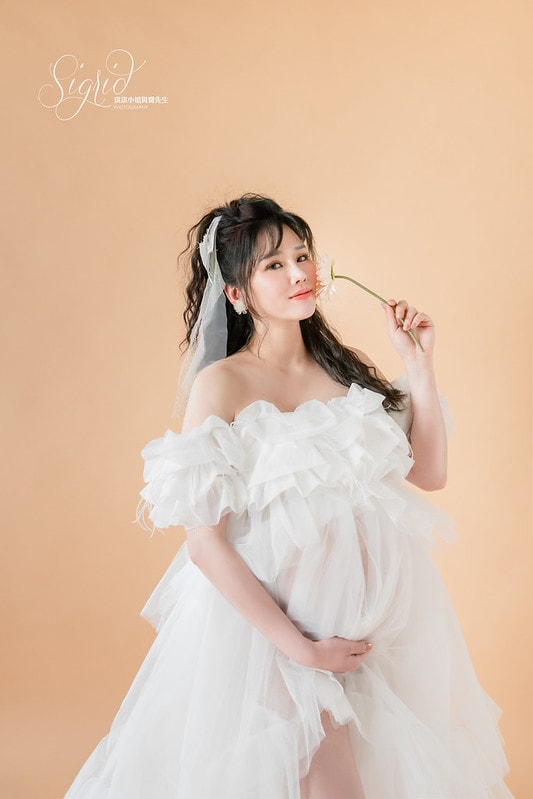 琪琪小姐孕婦寫真Apple 3906-2 logo